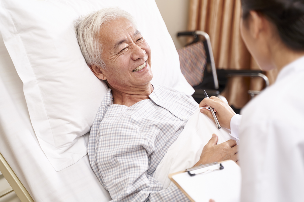 Patient in hospital bed