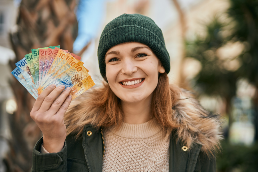 Woman holding cash